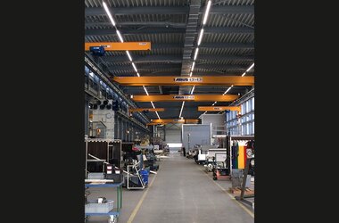 14 travelling cranes in two material handling levels in company Kiremko in Netherlands