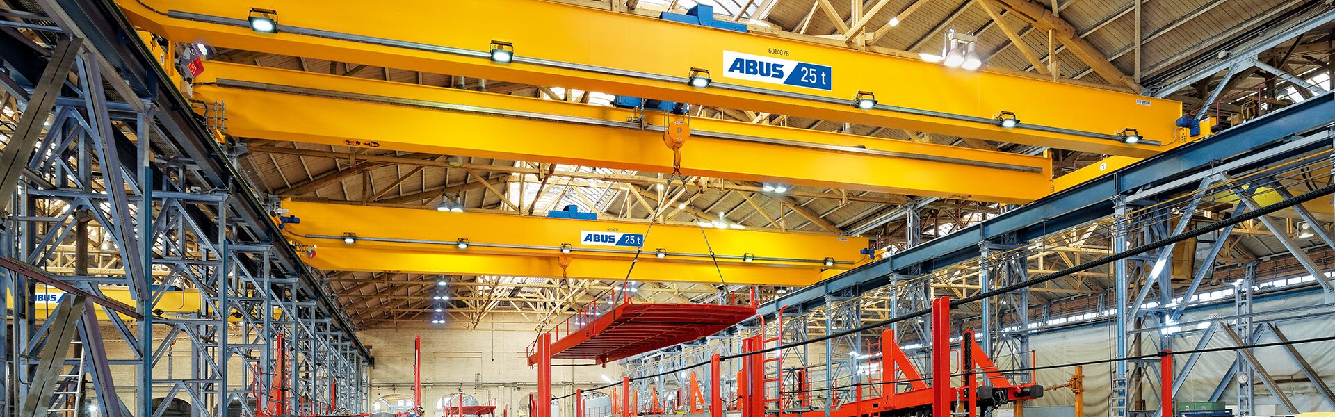 Double-girder overhead travelling crane with LED light line at the WBN Waggonbau company in Niesky