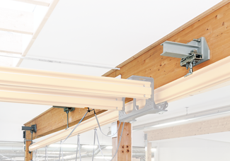 Normal bracket to wooden truss